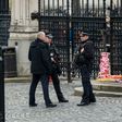 Armed police stand guard at the entrance to the Houses of Parliament which remain closed in central London on March 24, 2017 two days after the March 22 terror attack on the British parliament and Westminster Bridge