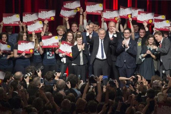 Austrian Presidential candidate Alexander Van der Bellen celebrates with supporters at a post-election event in Vienna on December 4, 2016