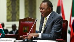 President Uhuru Kenyatta laughing