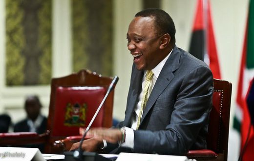 President Uhuru Kenyatta laughing