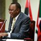President Uhuru Kenyatta laughing