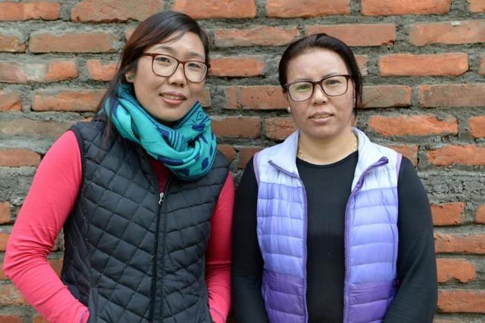 Furdiki Sherpa and Nima Doma Sherpa hail from the Himalayan people revered for their skill at high altitudes as climbing guides, but as it is traditionally a male domain neither dreamed of reaching Everest themselves -- until now