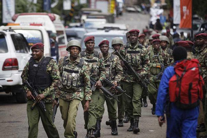 A group of police officers during a past patrol