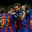 Barcelona's Alcacer celebrates with teammates after scoring a goal during their match against Athletic Club Bilbao at the Camp Nou stadium in Barcelona on February 4, 2017