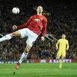 Manchester United's Zlatan Ibrahimovic (C) jumps for the ball during their UEFA Europa League match against FC Rostov, at Old Trafford in Manchester, on March 16, 2017