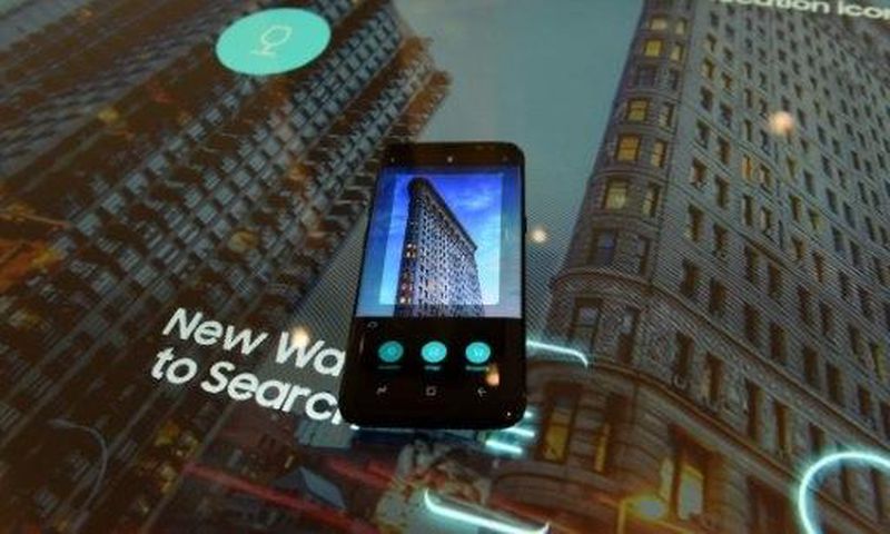 The new Samsung S8, incorporating its virtual assistant Bixby, seen on display in New York