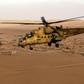 An Iraqi army Mi-35 helicopter flies over the village of Tall Abtah, near the city of Mosul on November 25, 2016