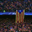 A giant Estelada, the flag for Catalan independence, is displayed by Barcelona supporters before a Champions League match at the Camp Nou stadium in Barcelona on April 19, 2017