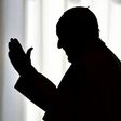 Pope Francis is silhouetted on March 24, 2017 at the Vatican