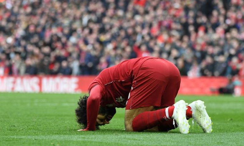 Liverpool's Egyptian forward Mohamed Salah celebrates after scoring a brilliant goal against Chelsea