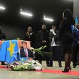 A woman stands in front of the coffin of Democratic Republic of Congo's opposition leader Etienne Tshisekedi during a funeral wake in his honour, in Brussels on February 5, 2017