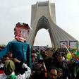 Iranians hold up a dummy representing US President Donald Trump during a rally in the capital Tehran on February 10, 2017 marking the anniversary of the 1979 Islamic revolution