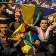 Protestors hold berber flags during a demonstration against corruption, repression and unemployment in Morocco's northern city of al-Hoceima on May 30, 2017