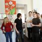 File picture shows cartoonist Catherine Meurisse (R) at an editorial meeting at the Paris office of French satirical magazine Charlie Hebdo