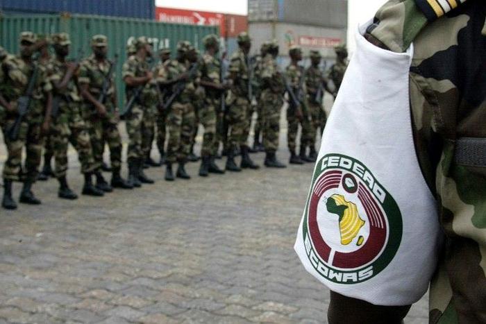 A Senegalese soldier wearing the colours of the ECOWAS force. This picture shows troops arriving in Abidjan on 18 January 2002