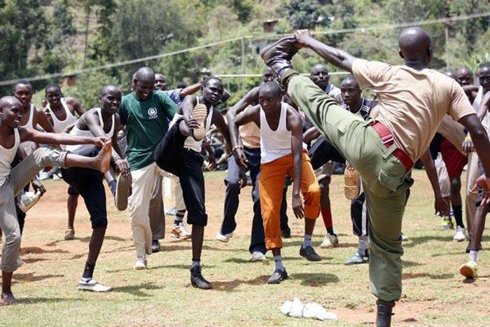 Prospective police recruits are guided during a physical exercise session at Kabarnet Stadium in Baringo Central on April 20, 2015.