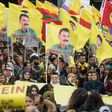 Kurdish protesters demonstrate with placards reading "No to dictatorship" and the portrait of the leader of the Kurdistan PKK Workers' Party, Abdullah Ocalan in the city center of Frankfurt am Main, western Germany, on March 18, 2017