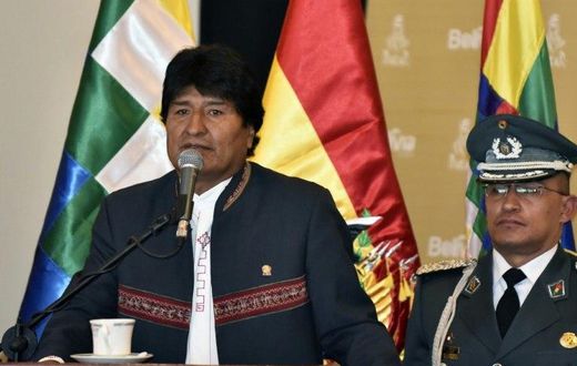 Bolivia's President Evo Morales Ayma (L), speaks during the presentation of the Rally Dakar 2018 in La Paz, on March 29, 2017