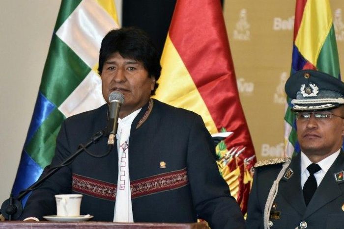 Bolivia's President Evo Morales Ayma (L), speaks during the presentation of the Rally Dakar 2018 in La Paz, on March 29, 2017