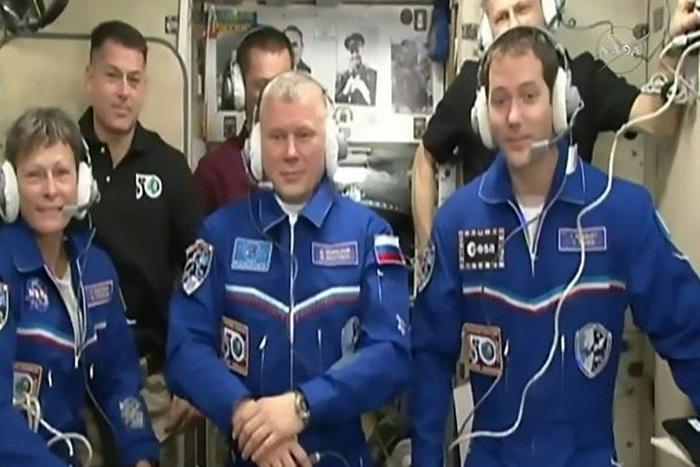 NASA astronaut Peggy Whitson (L), Russian cosmonaut Oleg Novitskiy (C) and Thomas Pesquet (R) of the ESA after docking at the ISS