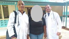 Dr Landy Rodriguez (R) and Herera Correa (L) with a Kenyan community worker (C)