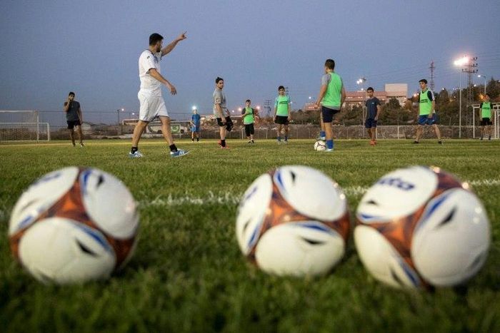 Palestinian leaders have demanded that the Israeli federation be suspended from world football unless it orders the clubs to relocate to within Israel's internationally recognised borders