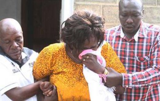 Family members overcome by grief during the burial of Collins Kipyegon Kalya