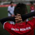 A Chinese boy takes part in a training session after the opening ceremony of Bayern Munich's office in Shanghai on March 22, 2017