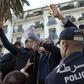 Algerian trade unionists gather outside the People's National Assembly bulding in the capital Algiers on November 27, 2016, to protest a draft law on pension reforms