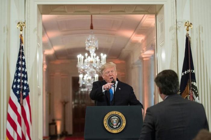 Aides to President Donald Trump, seen in a heated exchange with CNN correspondent Jim Acosta, stepped up attacks on the media after a two-year investigation concluded he did not collude with Russia in the 2016 election