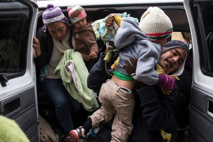 Central American refugees wait near the US-Mexico border as they seek asylum in the United States