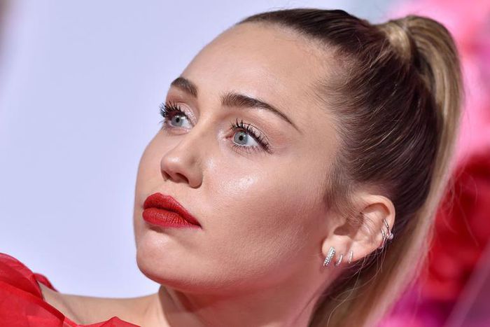 Why Miley Cyrus Walked the Red Carpet Alone
