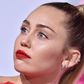 Why Miley Cyrus Walked the Red Carpet Alone