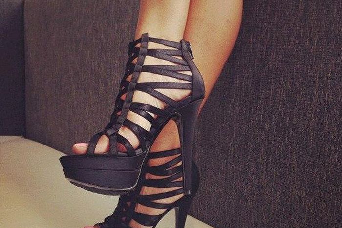 A woman in gladiator heels