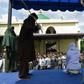 Hundreds watched as an 18-year-old Indonesian woman was flogged outside a mosque in the capital of Aceh province