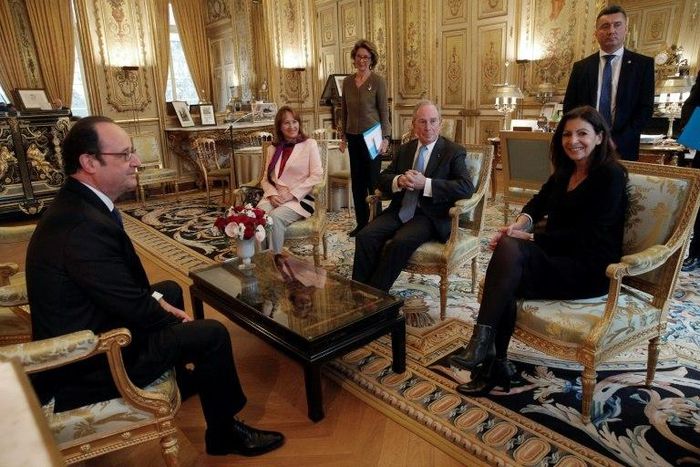French president Francois Hollande, French Minister for Ecology, Sustainable Development and Energy Segolene Royal, former New York City Mayor Michael Bloomberg and Paris mayor Anne Hidalgo during a meeting in Paris, on March 9, 2017