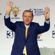 Turkish President Tayyip Erdogan waves to supporters during an extraordinary congress of the ruling AK Party (AKP) in Ankara, on May 21, 2017