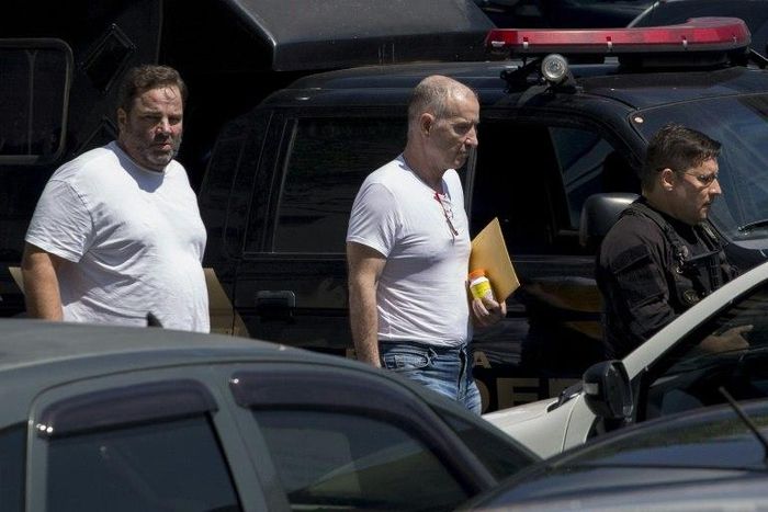 Brazil Supreme Court Justice Gilmar Mendes said while businessman Eike Batista's (C) alleged crimes were serious, they did not warrant being jailed during legal proceedings