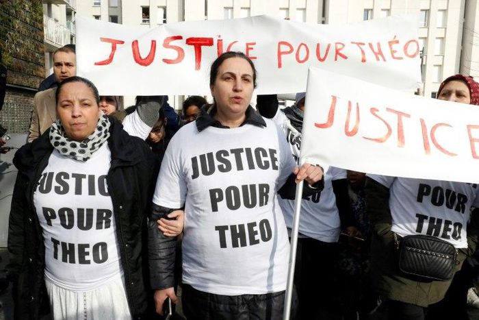 Protesters holding signs calling for "Justice for Theo" march on Monday in the Paris suburb of Aulnay-sous-Bois, referring to the man who was allegedly sodomised during a police arrest last week