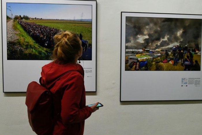 An exhibition showcasing the work of Agence France-Presse photographers who have documented the hope and heartbreak of Europe's migration crisis opened at the Bozar arts centre in Brussels, on May 3, 2017