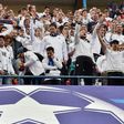 Real Madrid fans cheer their team before their UEFA Champions League semifinal second leg football match against Club Atletico de Madrid at the Vicente Calderon stadium in Madrid, on May 10, 2017