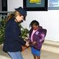Police officer Maria Volpe takes care of Oumoh in Lampedusa on November 5