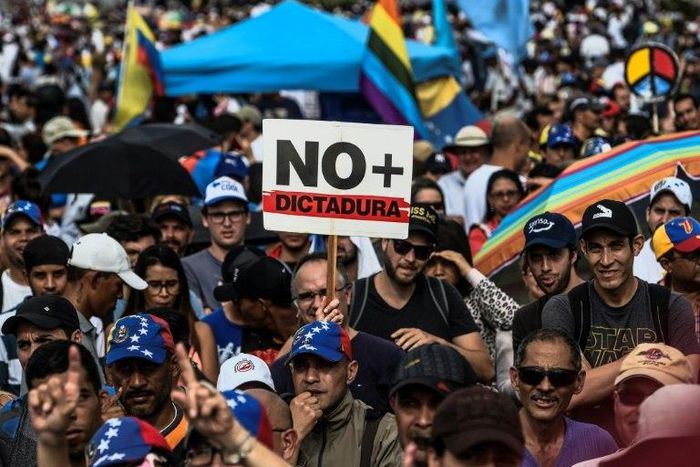 Venezuelan opposition activists protest against the government of President Nicolas Maduro, in Caracas, on May 15, 2017