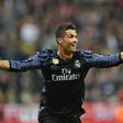 Real Madrid's forward Cristiano Ronaldo reacts after scoring during the UEFA Champions League 1st leg quarter-final football match against Bayern Munich April 12, 2017