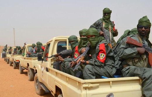 Malian army soldiers, pro-government militia members and former rebels, take part in their first joint patrol in Gao in northern Mali in February