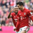 Bayern Munich's striker Robert Lewandowski (R) and Bayern Munich's midfielder Arturo Vidal (L) celebrate after the third goal for Munich during the German First division Bundesliga football match Bayern Munich vs Eintracht Frankfurton March 11, 2017