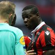 Nice's forward Mario Balotelli (R) reacts after a red card on October 2, 2016