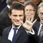 French Prime Minister Manuel Valls greets supporters after announcing his bid to become the Socialist presidential candidate in the 2017 presidential elections, at the town hall of Evry