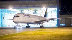 The first Airbus A350-900 for Lufthansa is rolled out of the Airbus paint shop