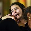 Women mourn the victims of the blast at Saint Mark's church in Egypt's Alexandria during a funeral procession on April 10, 2017